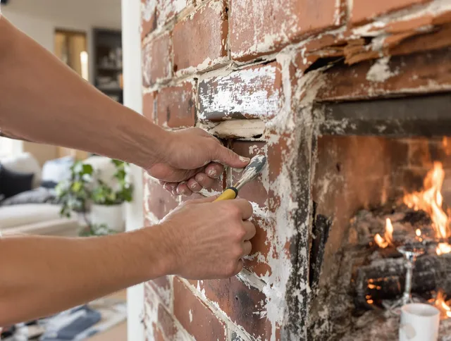 Routine fireplace repair by North Olmsted Chimney Sweep in North Olmsted, OH